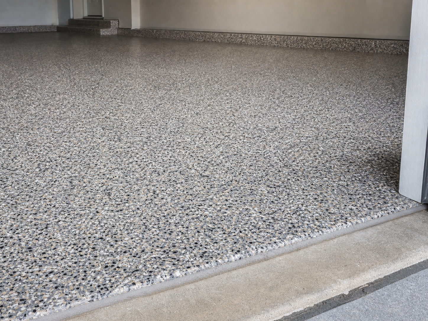 Polyaspartic floor coating by Golden Shore Home Contractors